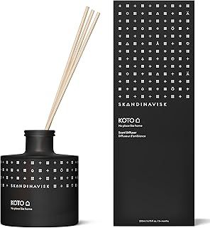 Skandinavisk KOTO 'Home' Scent Diffuser with 8 Reeds. Fragrance Notes: Vanilla Beans and Dried Orange Peel, Amber and Leather. 200 ml