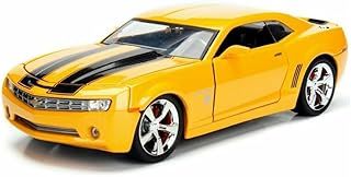 2006 Chevy Camaro Concept Yellow Bumblebee with Robot on Chassis and Collectible Metal Coin Transformers Movie 1/24 Diecast Model Car by Jada 98497